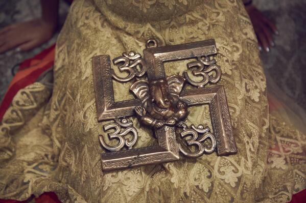 Asian faiths try to save swastika symbol corrupted by Hitler AP News